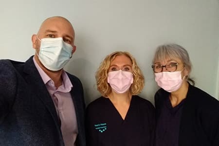 Sarah Hoggins, Kenny, and Wendy Alderson at the practice