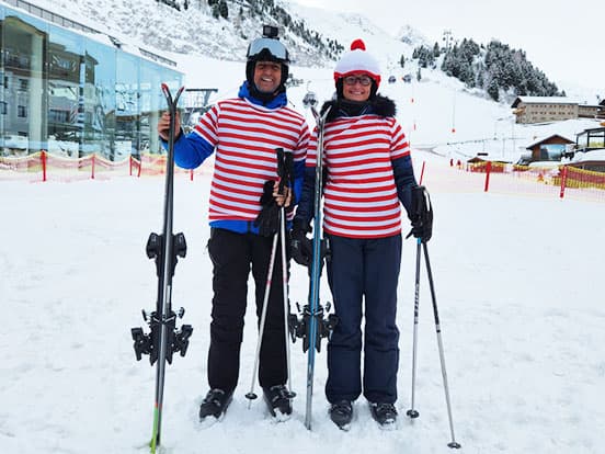 Denplan dentists wearing Where's Wally fancy dress on ski slope